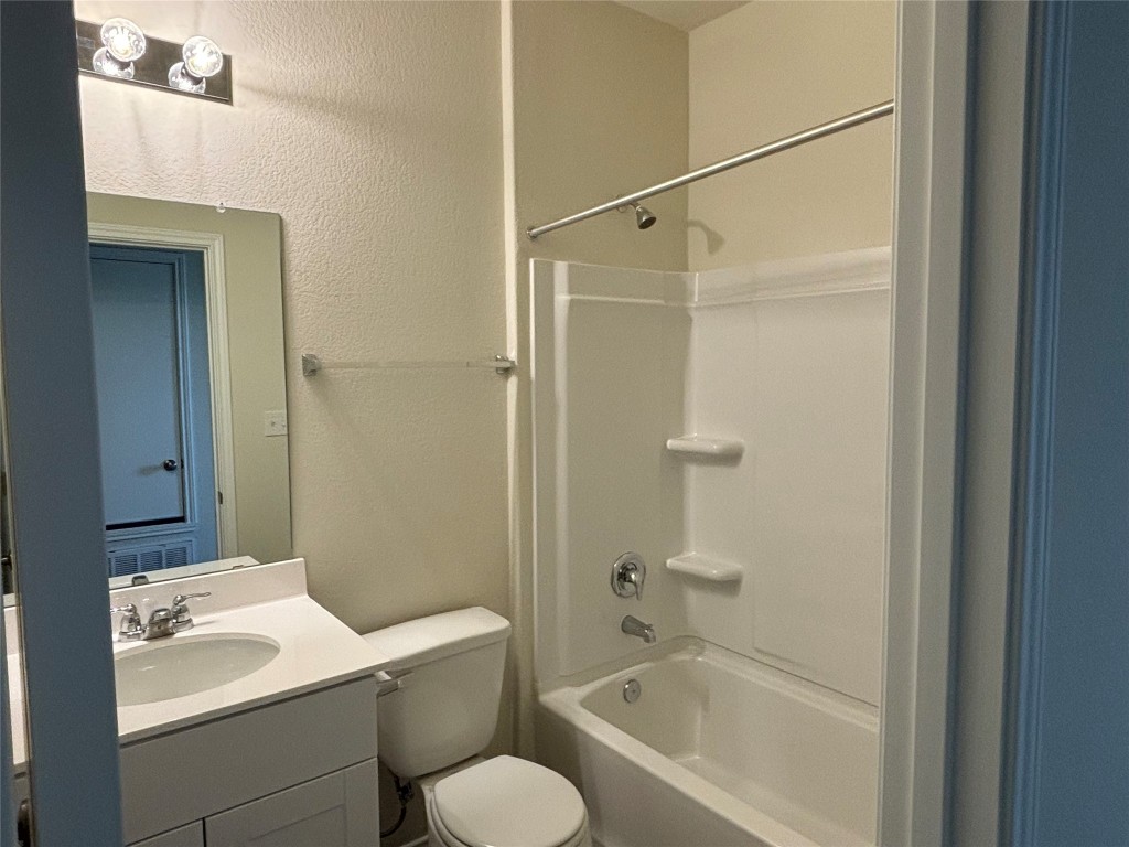 344 Tree Nut Loop Buda, TX 78610 - Photo 11 of 22 a bathroom with a sink toilet and shower