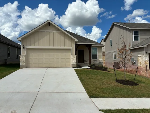 a front view of house with yard