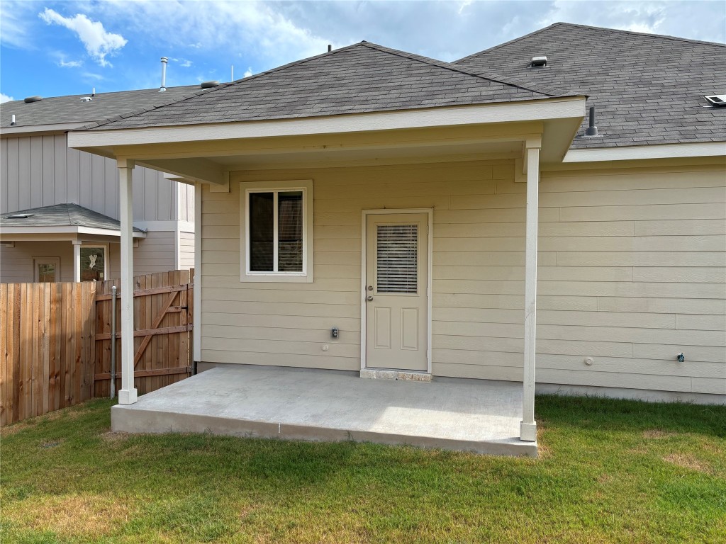 344 Tree Nut Loop Buda, TX 78610 - Photo 21 of 22 a view of a house with a backyard