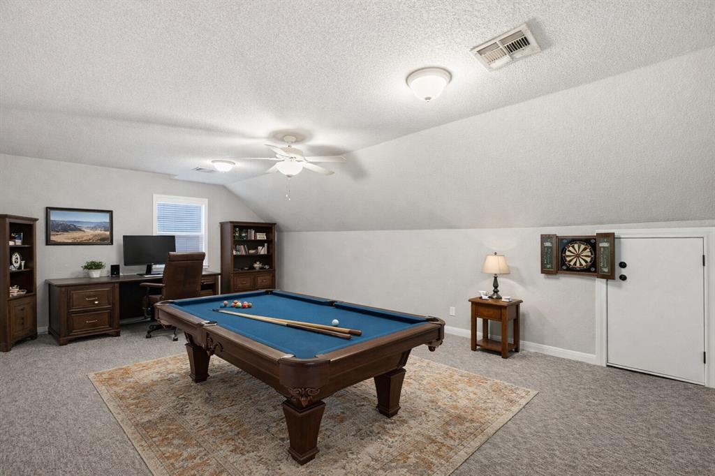 504 Casa Del Rancho Road Lorena, TX 76655 - Photo 18 of 39 a living room with furniture pool table and flat screen tv
