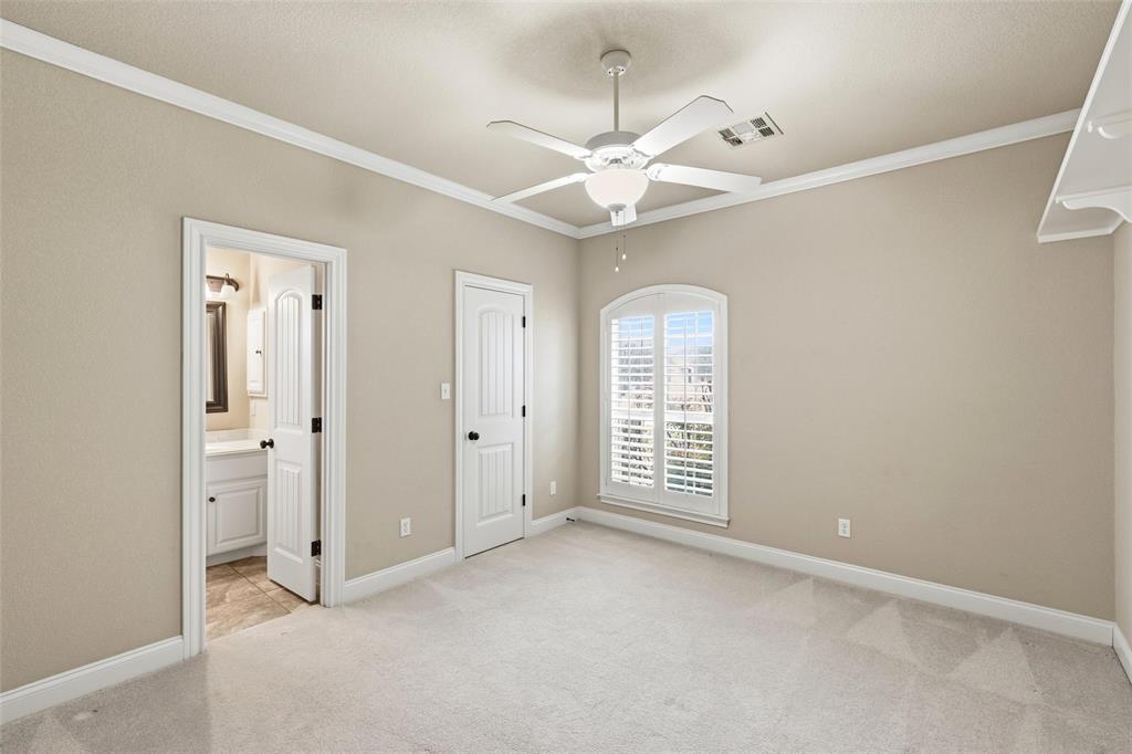 504 Casa Del Rancho Road Lorena, TX 76655 - Photo 19 of 39 an empty room with windows and fan