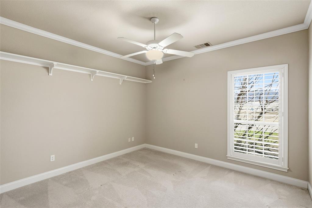 504 Casa Del Rancho Road Lorena, TX 76655 - Photo 21 of 39 an empty room with a window and a fan
