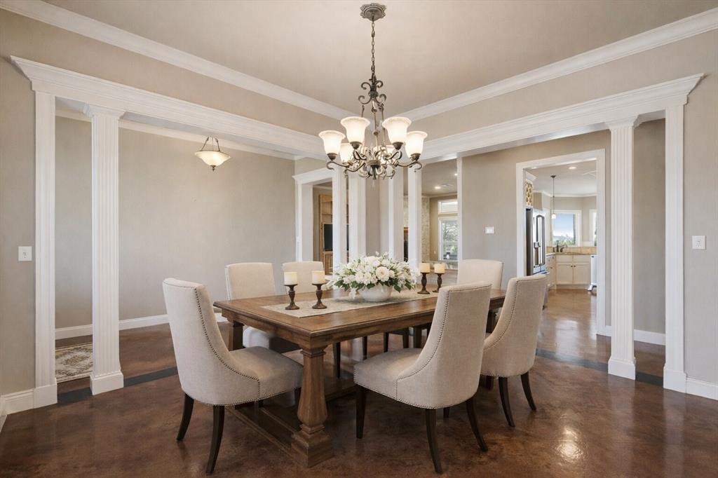 504 Casa Del Rancho Road Lorena, TX 76655 - Photo 5 of 39 a view of a dining room with furniture and wooden floor