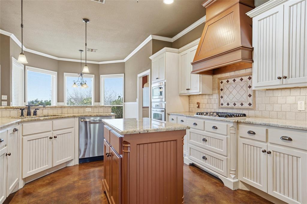 504 Casa Del Rancho Road Lorena, TX 76655 - Photo 7 of 39 a kitchen with sink cabinets and window