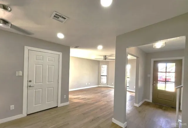 a view of entryway with wooden floor