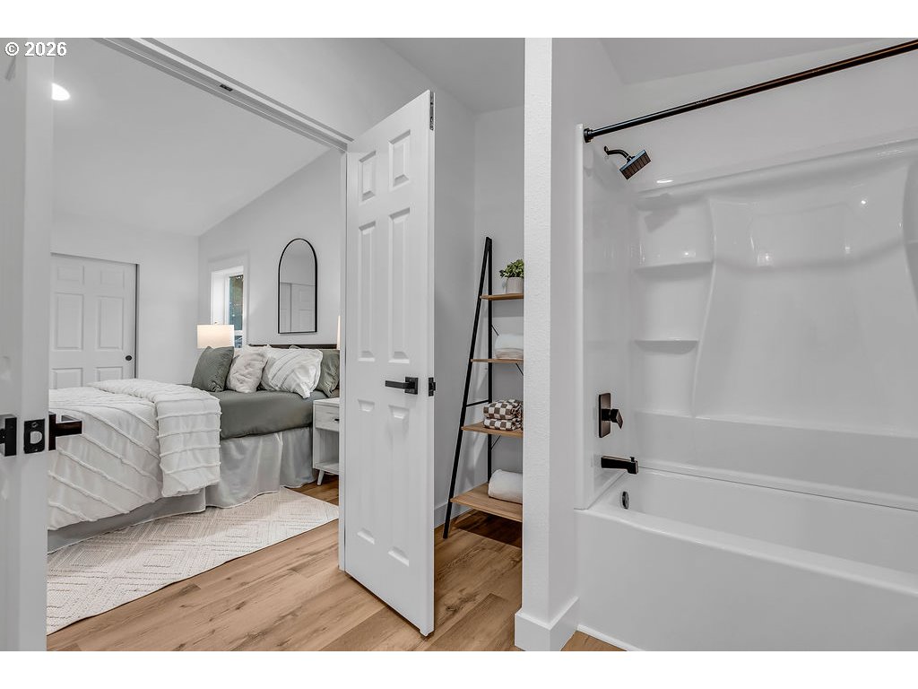 241 Northwest Wade Street Estacada, OR 97023 - Photo 29 of 45 a living room with furniture and a bath tub