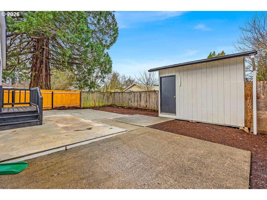 241 Northwest Wade Street Estacada, OR 97023 - Photo 43 of 45 a backyard of a house with wooden floor