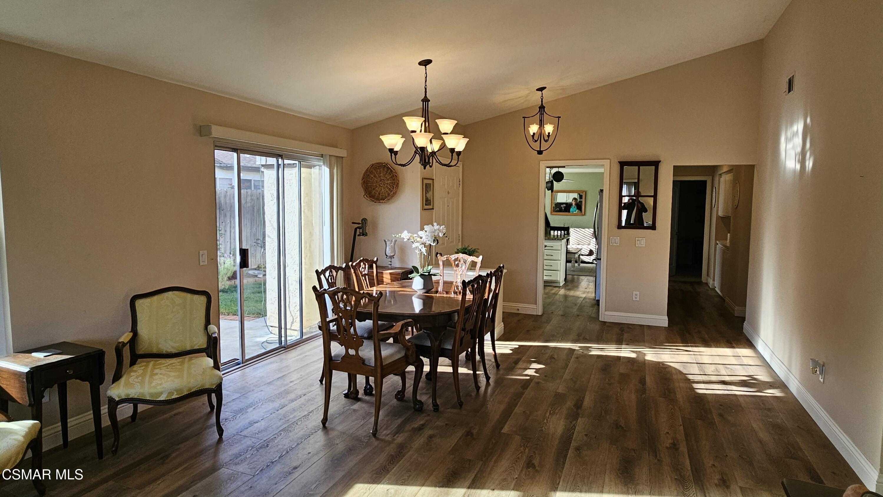 14640 Marymount Street Moorpark, CA 93021 - Photo 14 of 33 a view of a dining room with furniture window and wooden floor