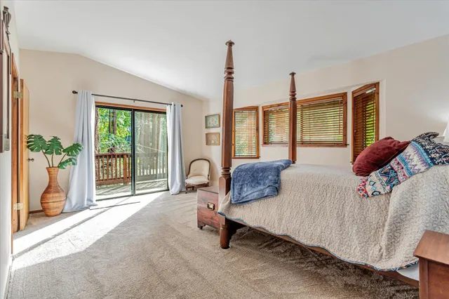 a view of a balcony with wooden floor
