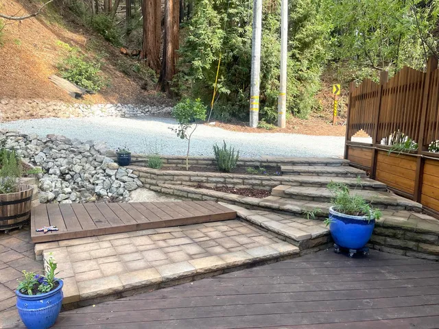 a view of a backyard with sitting area