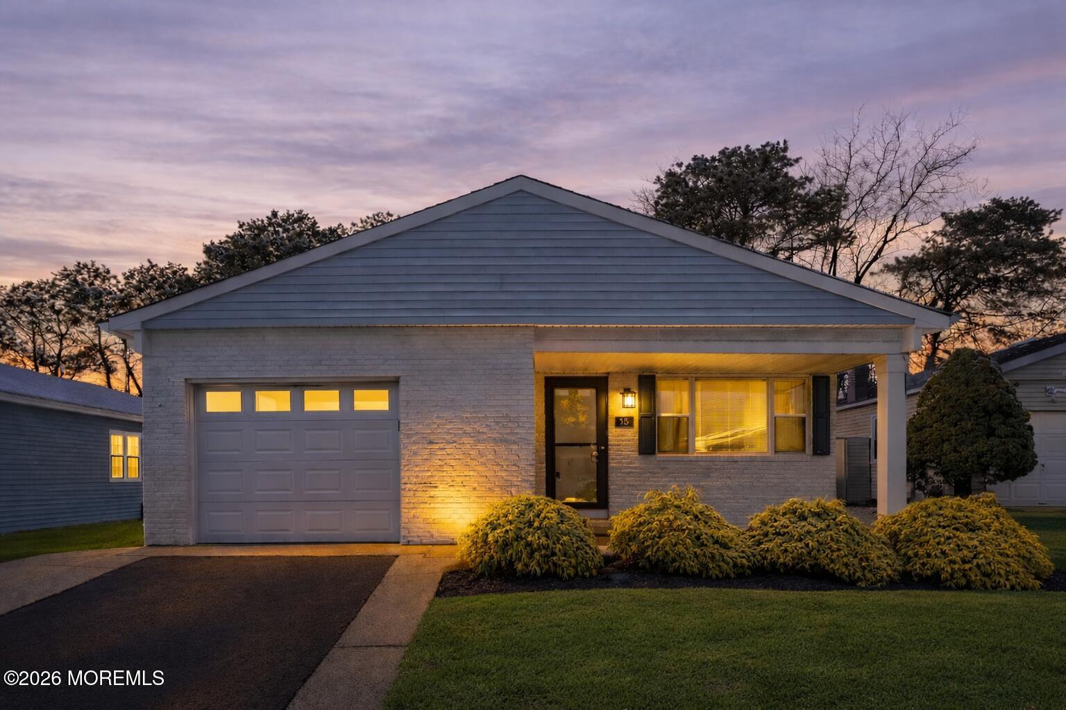 15 Encinitas Drive Toms River, NJ 08757 - Photo 1 of 45 Twilight glow on suburban home