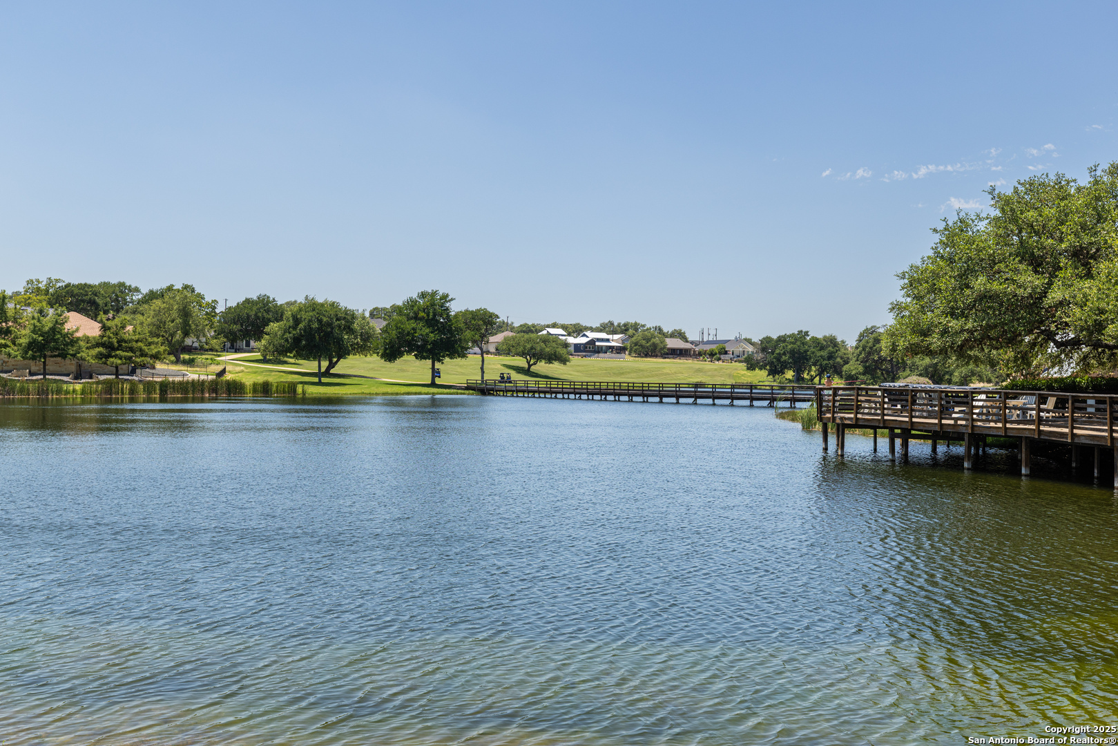 123 Levi English Blanco, TX 78606 - Photo 31 of 38 a view of a lake with houses