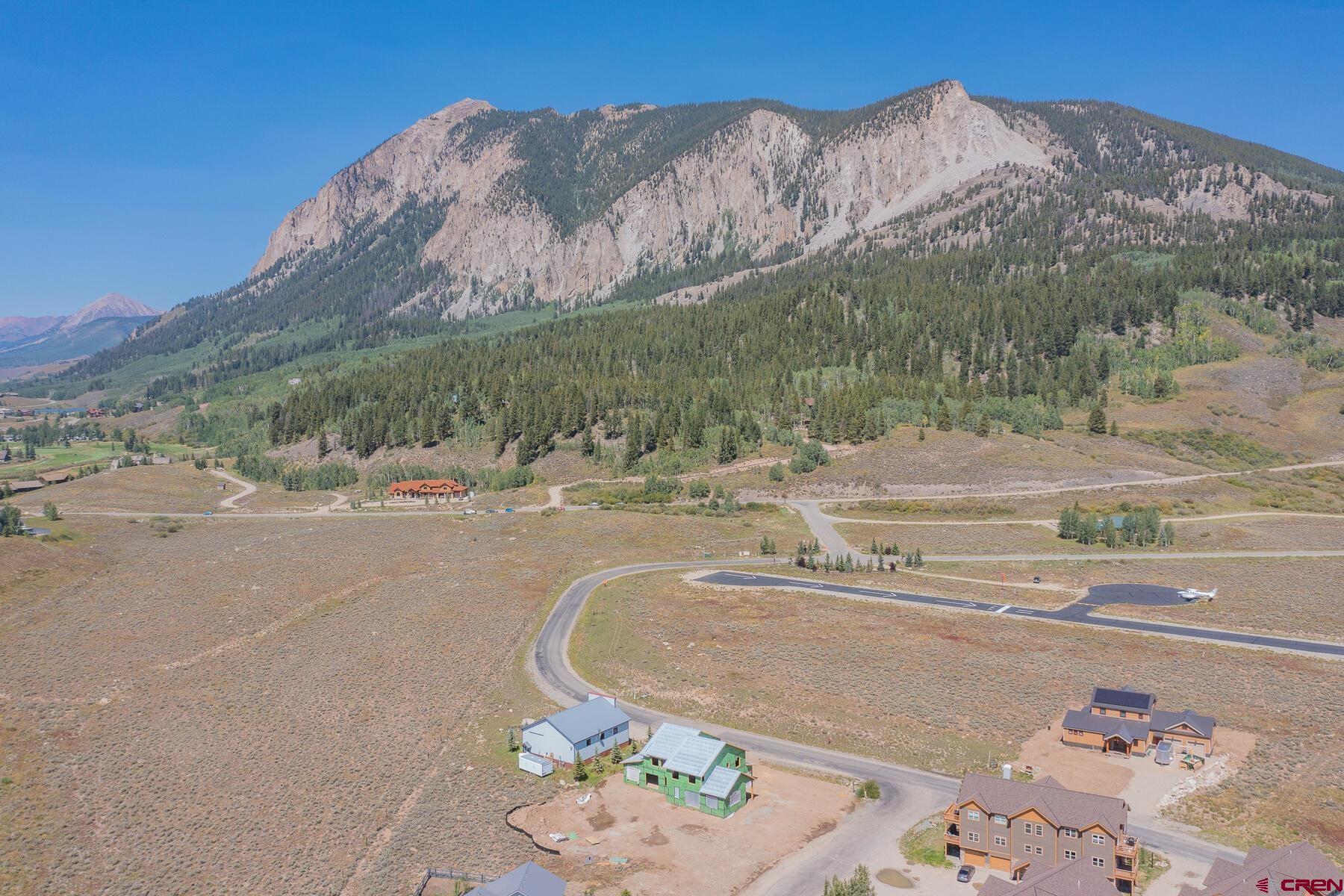 34 Elk Valley Road Crested Butte, CO 81224 - Photo 1 of 24 a view of a road with mountain view
