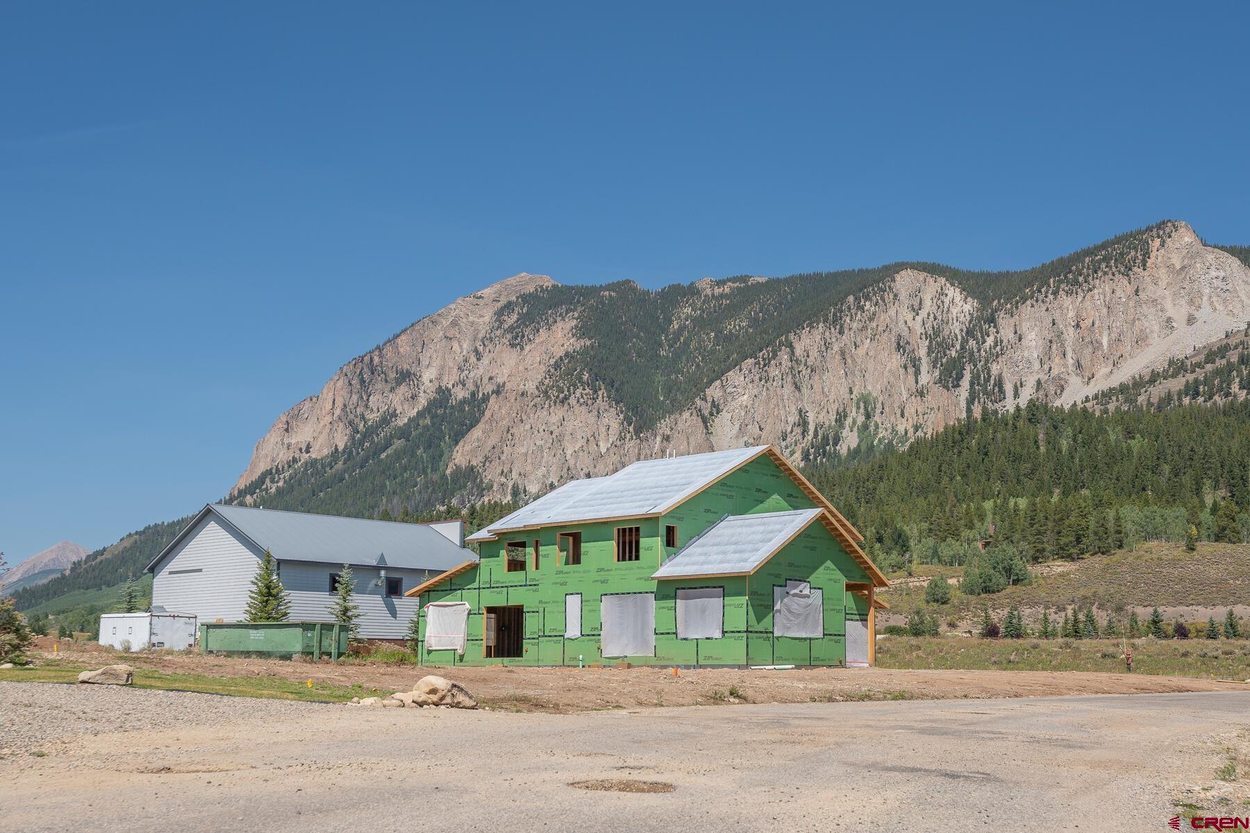 34 Elk Valley Road Crested Butte, CO 81224 - Photo 11 of 24 a house with a trees in the background