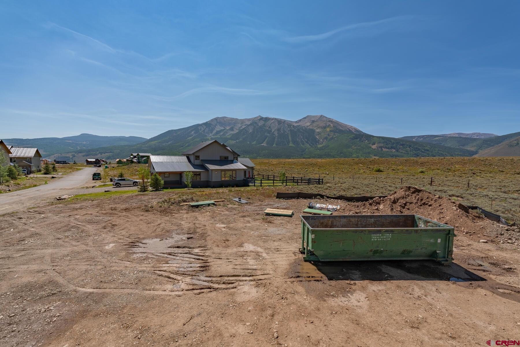 34 Elk Valley Road Crested Butte, CO 81224 - Photo 16 of 24 a view of a lake with a mountain