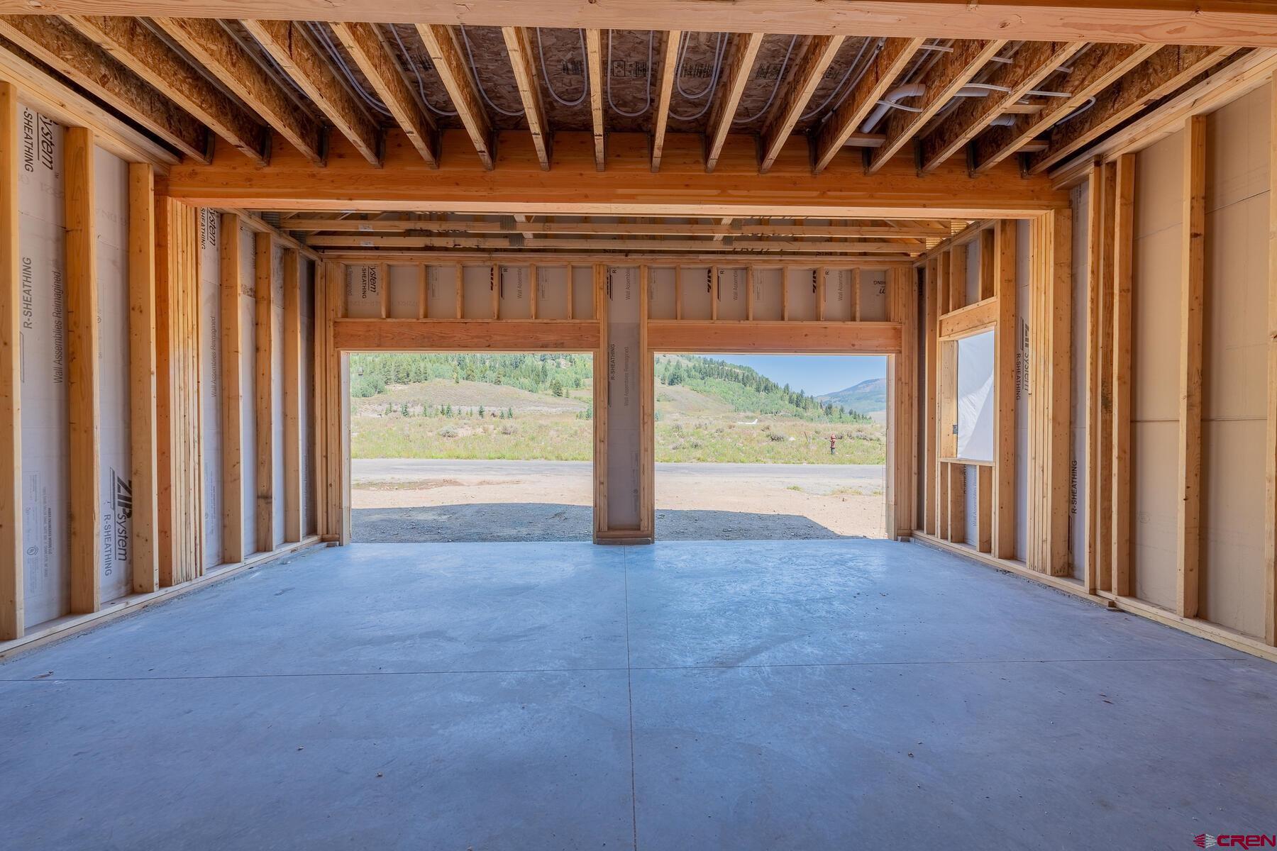 34 Elk Valley Road Crested Butte, CO 81224 - Photo 18 of 24 a view of an empty room with a window