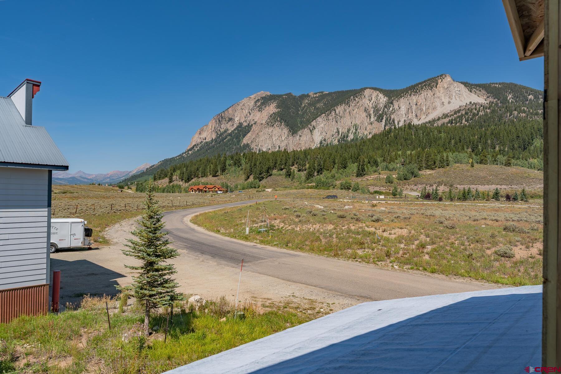 34 Elk Valley Road Crested Butte, CO 81224 - Photo 20 of 24 a view of a yard with a fountain