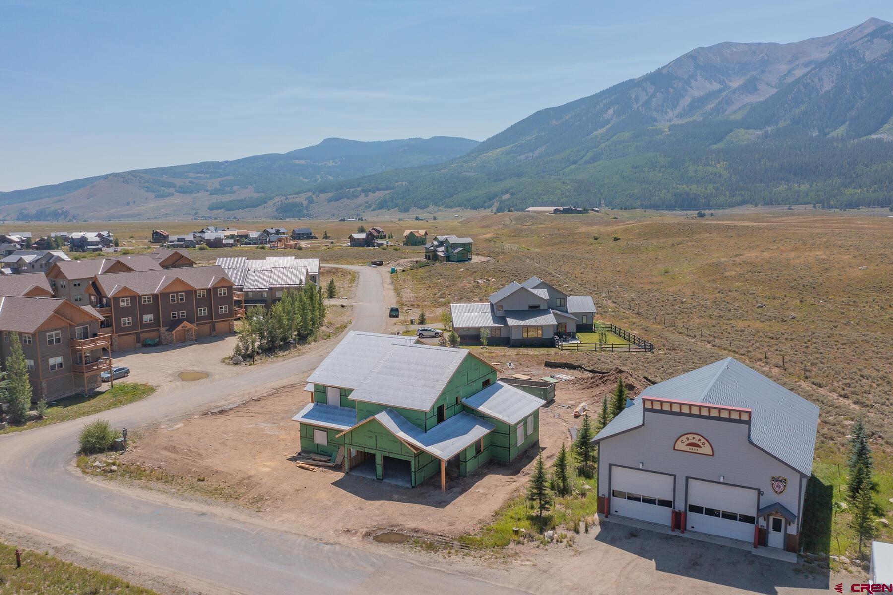 34 Elk Valley Road Crested Butte, CO 81224 - Photo 5 of 24 an aerial view of a house with ocean view