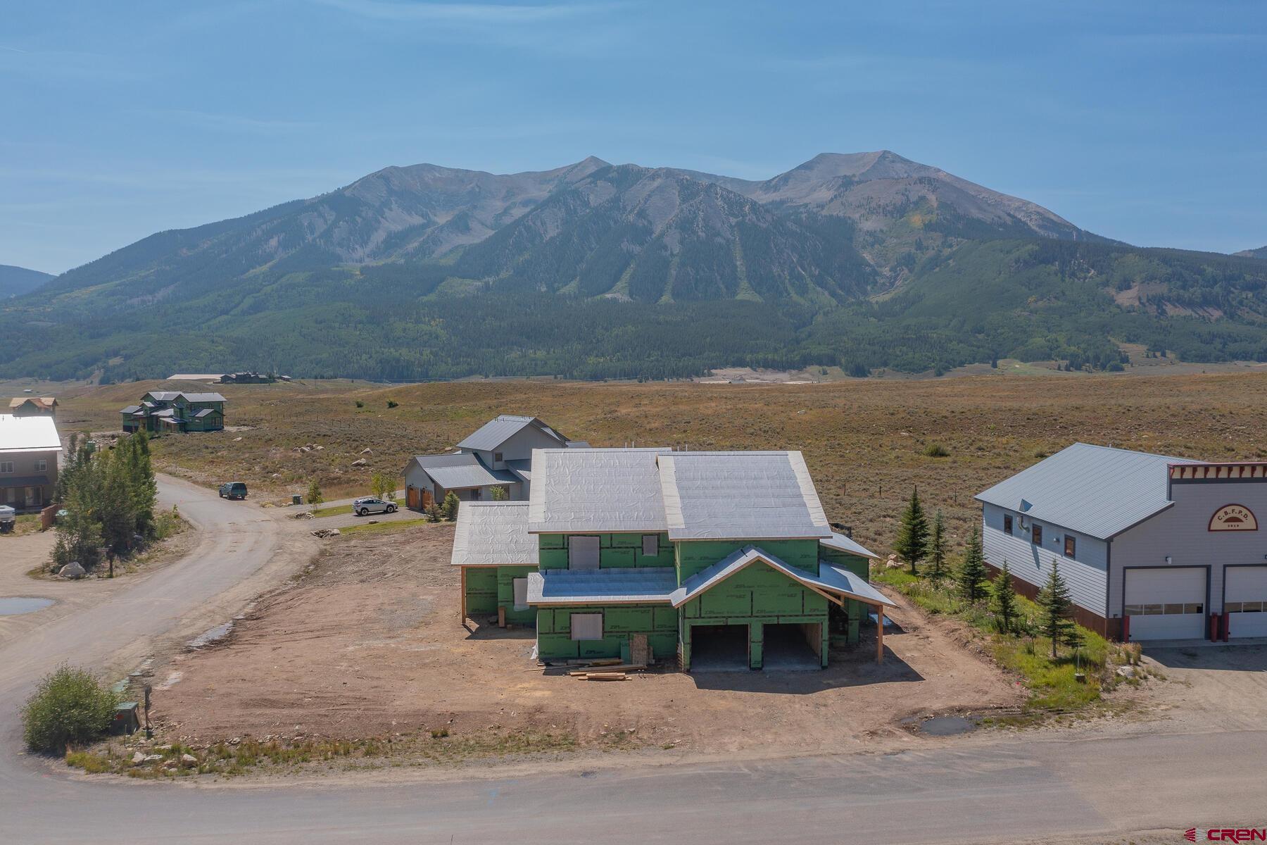 34 Elk Valley Road Crested Butte, CO 81224 - Photo 6 of 24 an aerial view of a house with a mountain