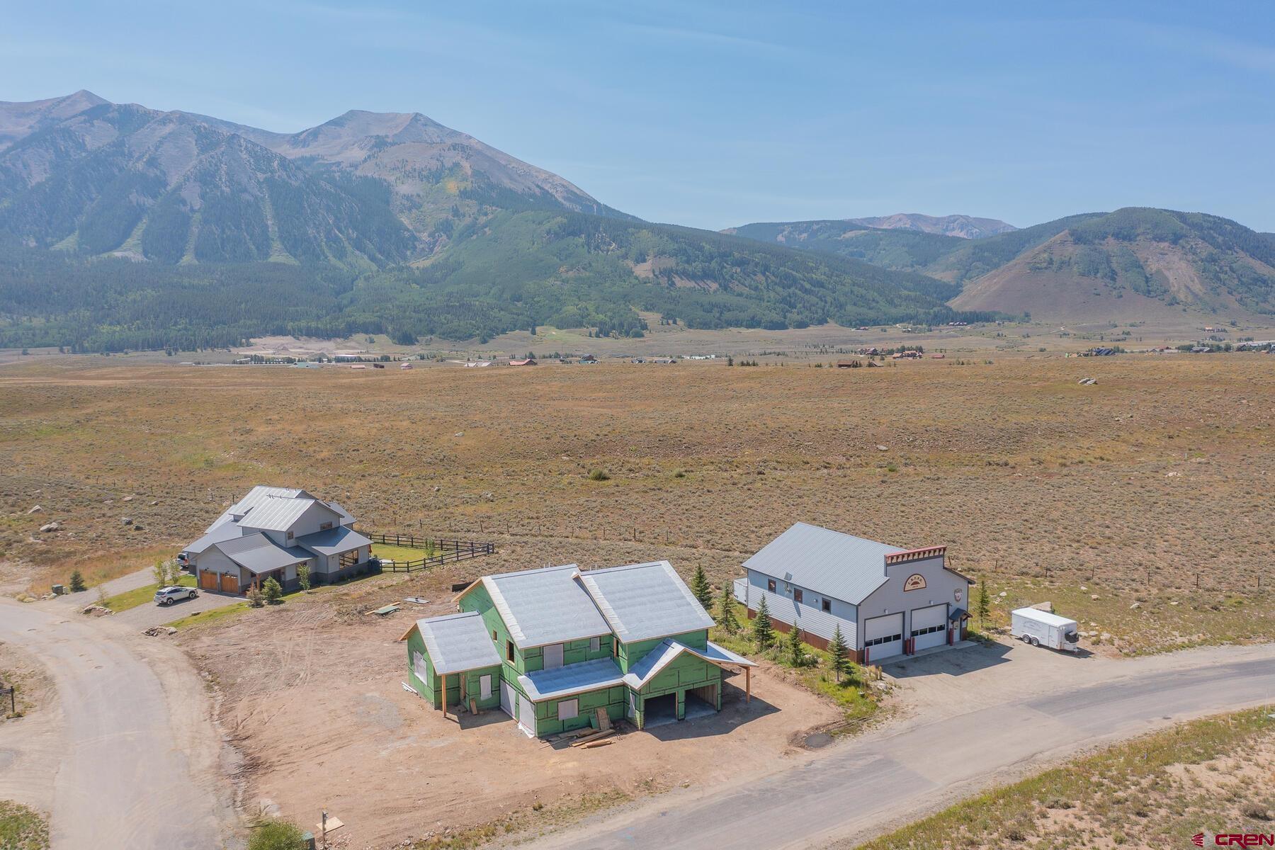 34 Elk Valley Road Crested Butte, CO 81224 - Photo 7 of 24 an aerial view of houses with a lake