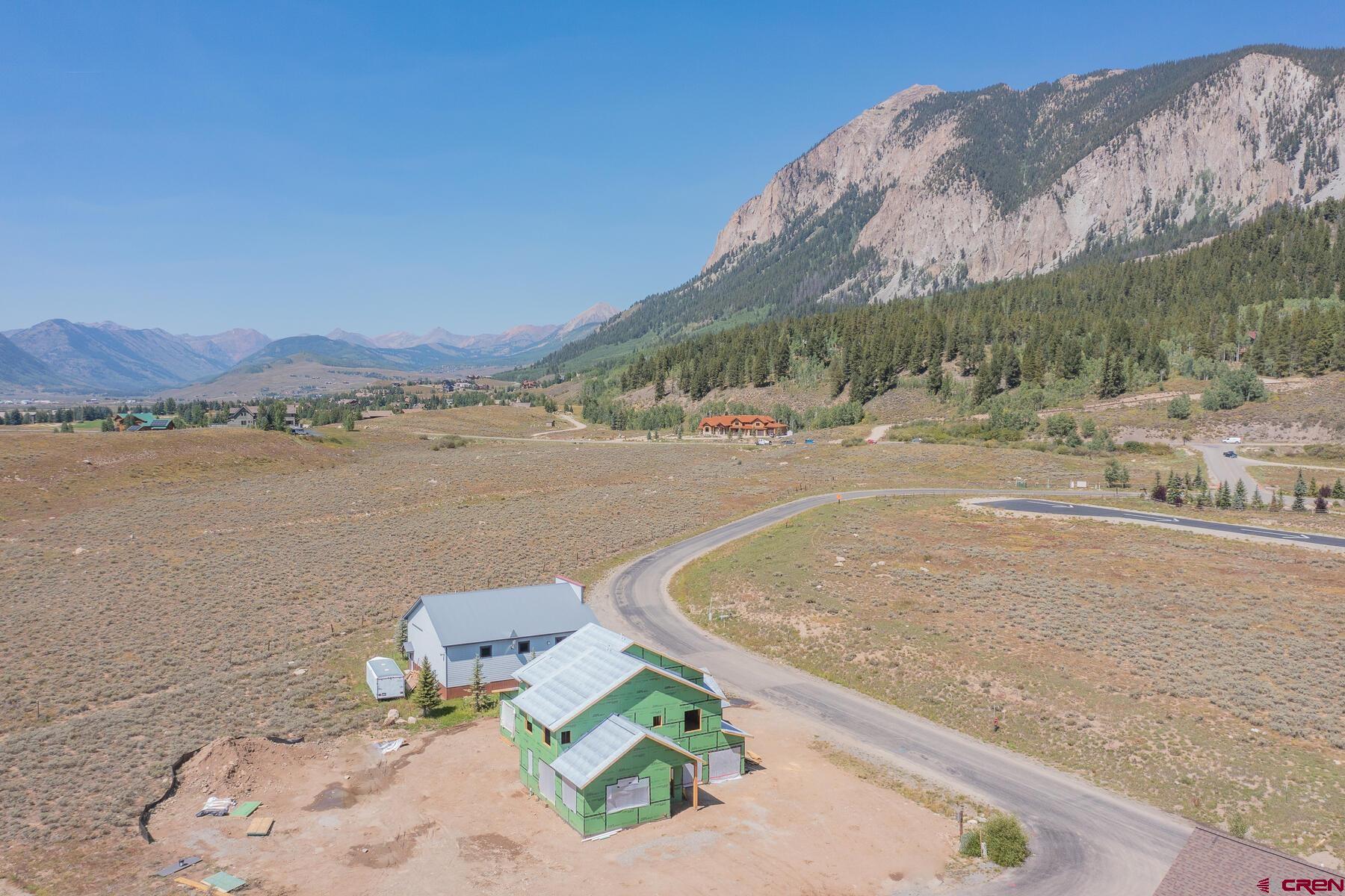 34 Elk Valley Road Crested Butte, CO 81224 - Photo 9 of 24 swimming pool view with a lake view