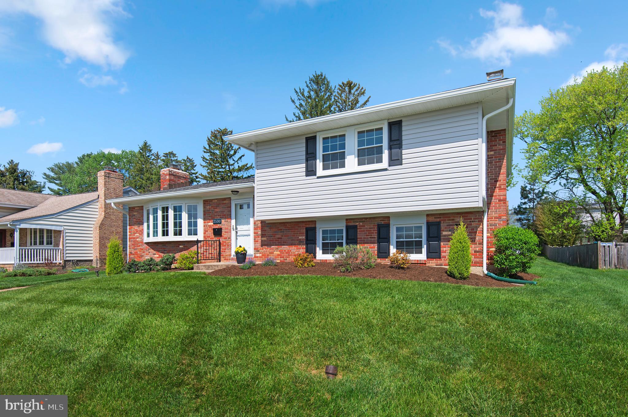 2530 Londonderry Road Lutherville-Timonium, MD 21093 - Photo 1 of 43 a front view of a house with a yard