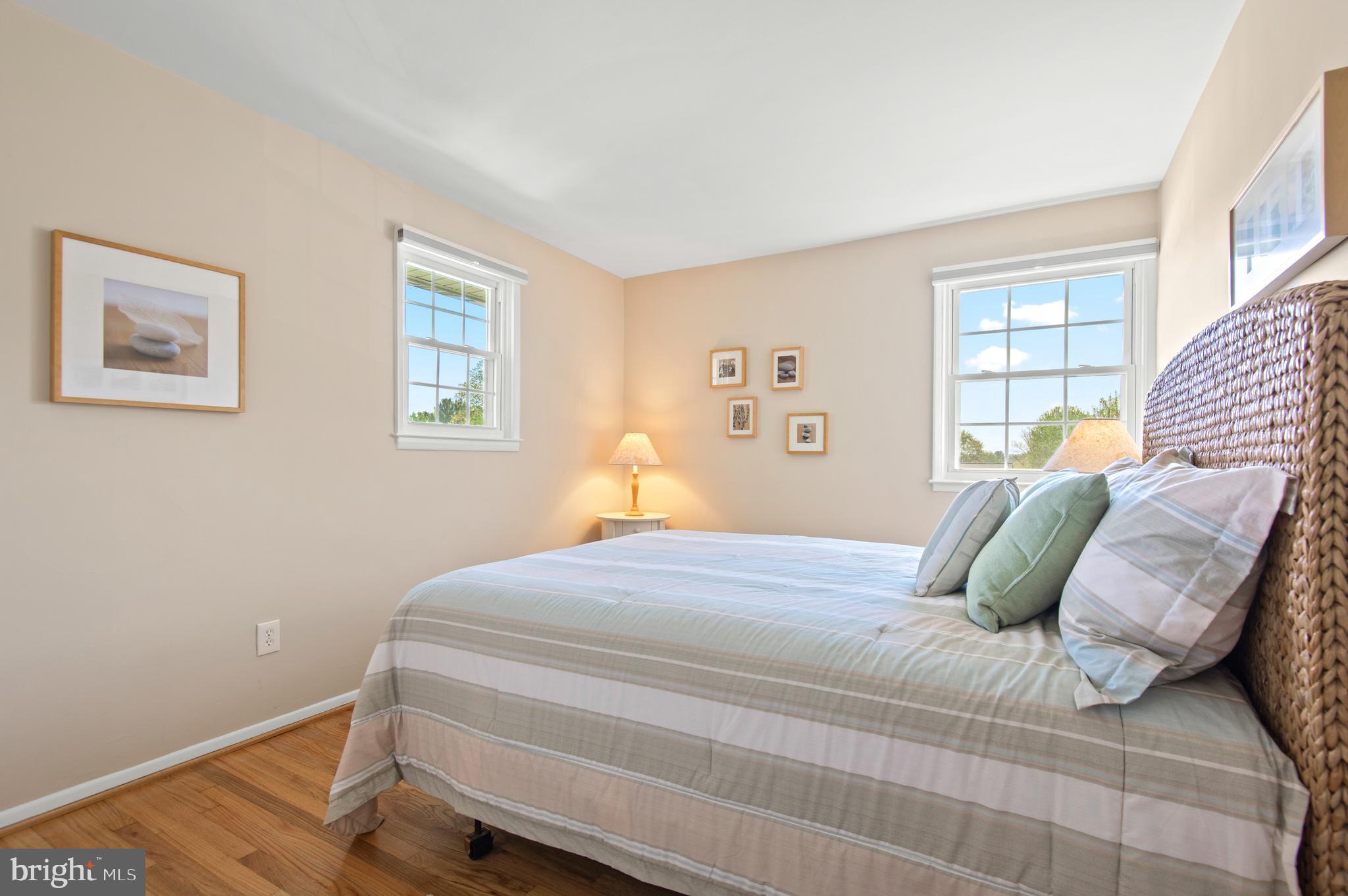 2530 Londonderry Road Lutherville-Timonium, MD 21093 - Photo 20 of 43 a bedroom with a bed and wooden floor