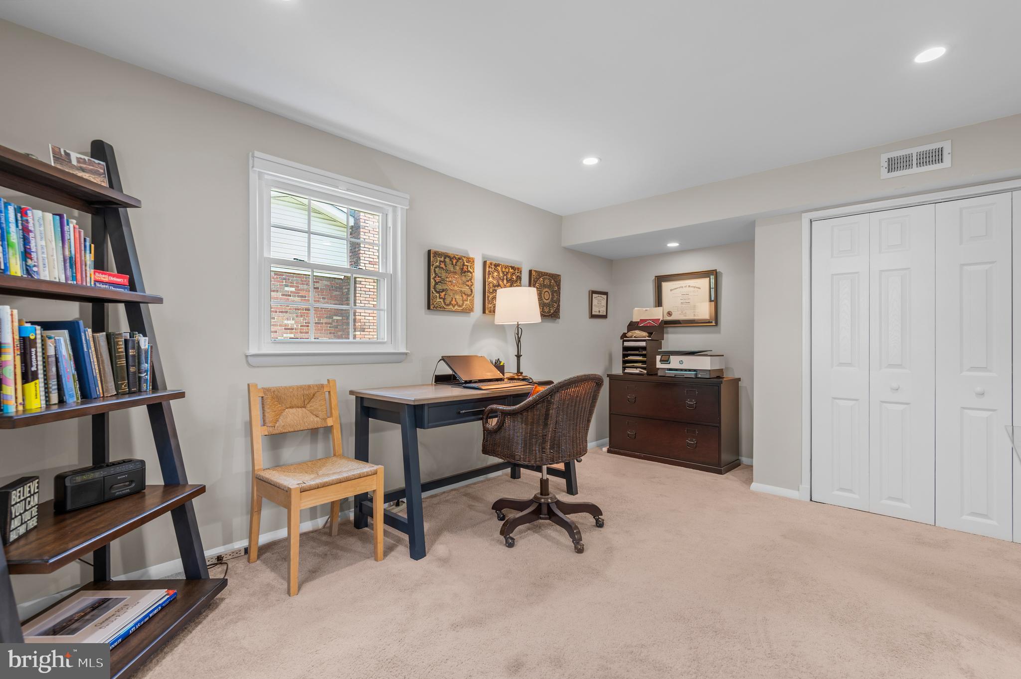 2530 Londonderry Road Lutherville-Timonium, MD 21093 - Photo 24 of 43 a view of a workspace with furniture and a bookshelf