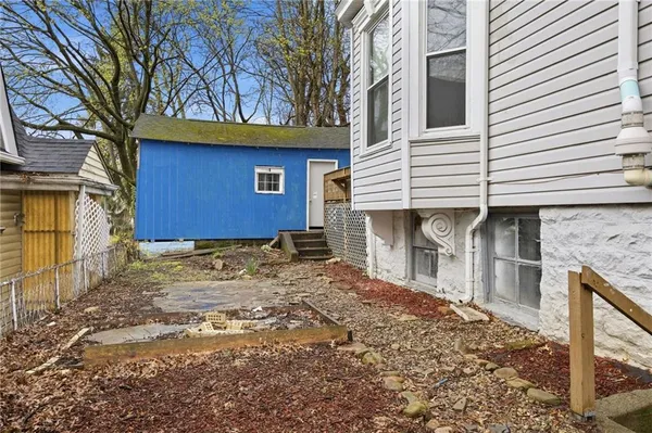 a house with trees in front of it