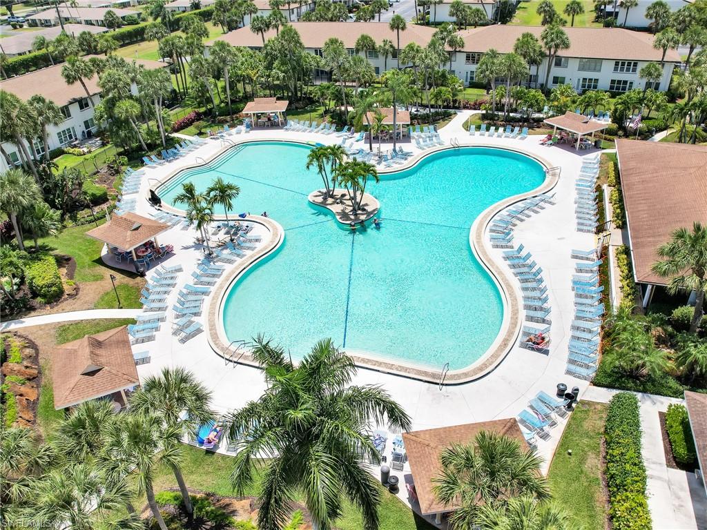 4230 Jack Frost Court, Unit 7 Naples, FL 34112 - Photo 4 of 23 an aerial view of a swimming pool
