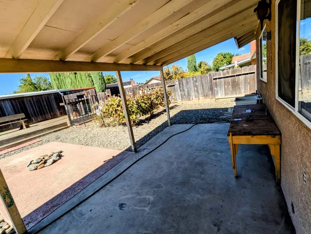 a view of a house with a patio