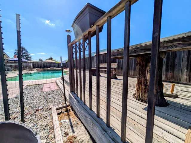 a kitchen with a sink and a large window