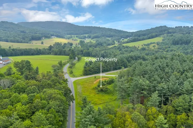a view of a lake with a mountain in the background