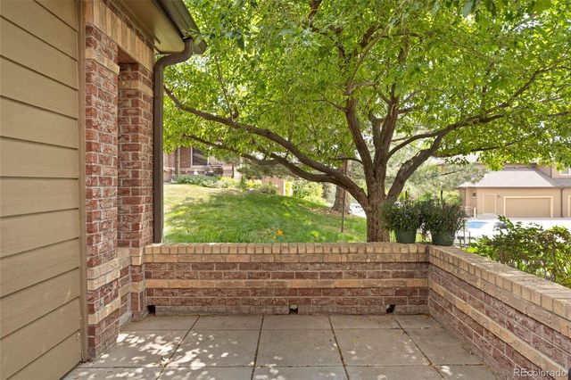 a view of a bench in a yard