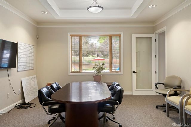 a patio with table and chairs