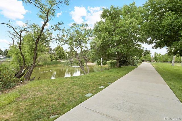 a view of a lake and a yard