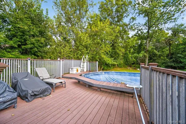 a view of a backyard with a deck