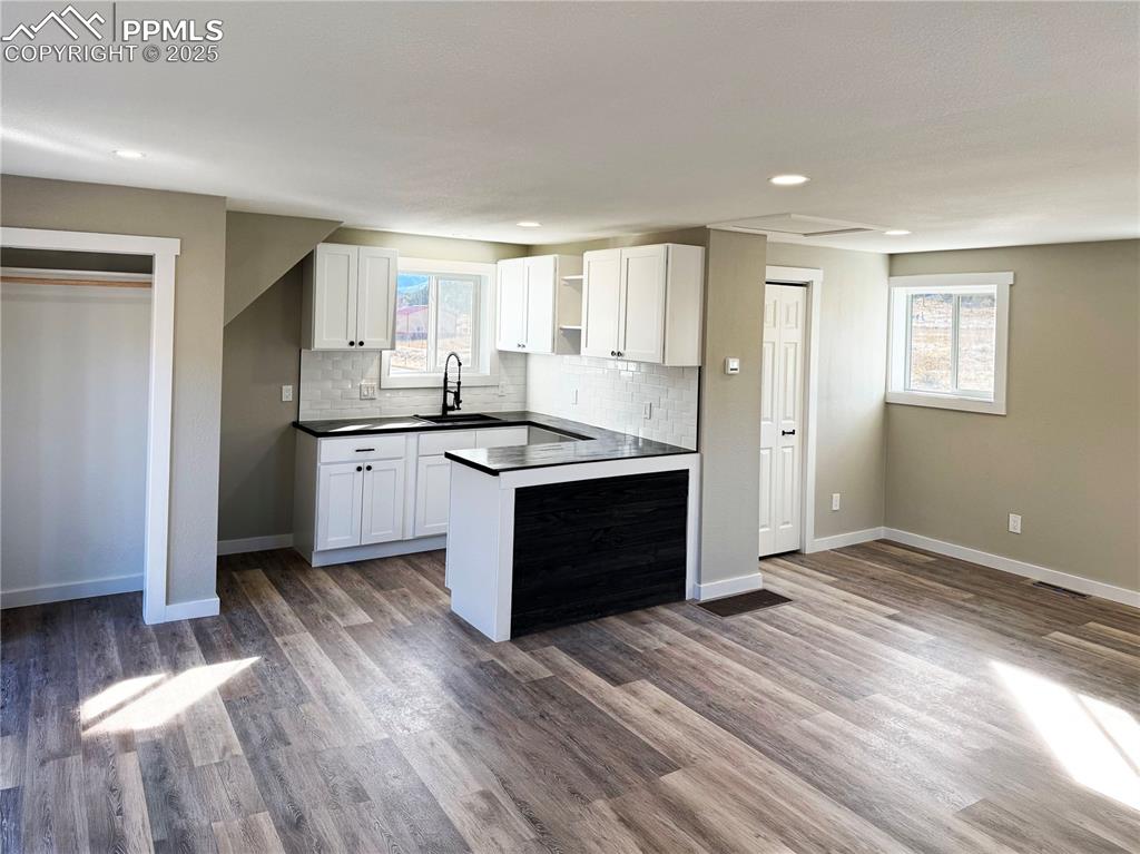 7101 Highway 50 Salida, CO 81201 - Photo 35 of 50 a kitchen with stainless steel appliances granite countertop a stove a sink and a refrigerator