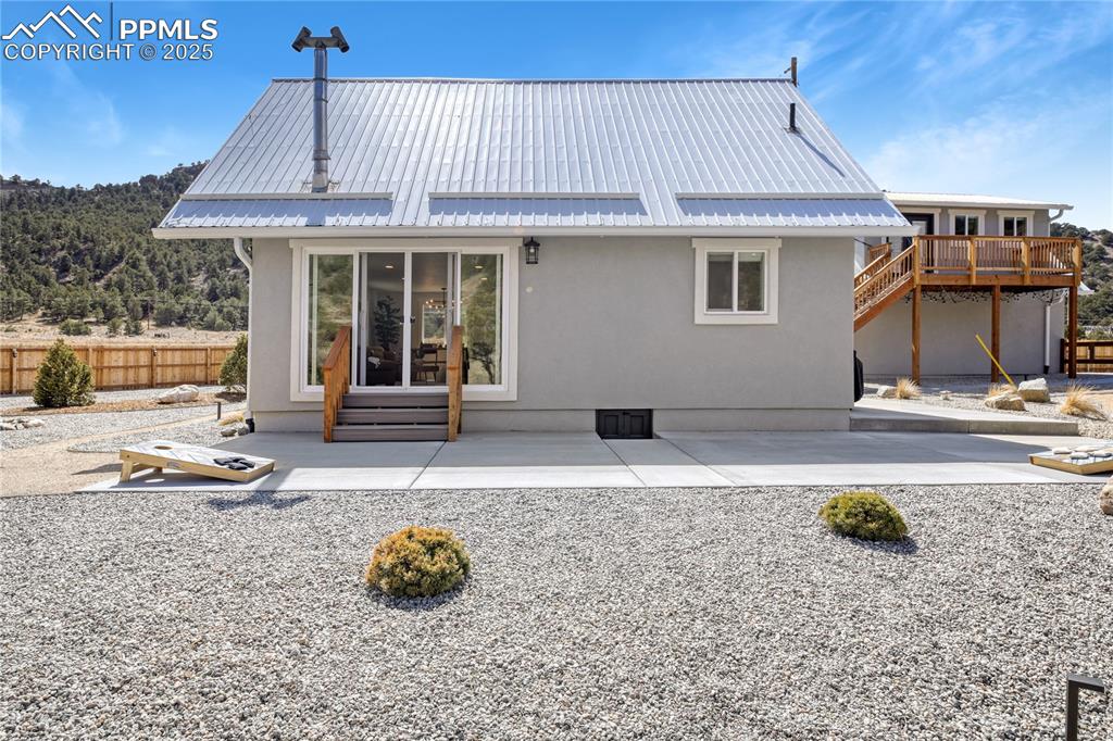 7101 Highway 50 Salida, CO 81201 - Photo 6 of 50 a backyard of a house with barbeque oven table and chairs