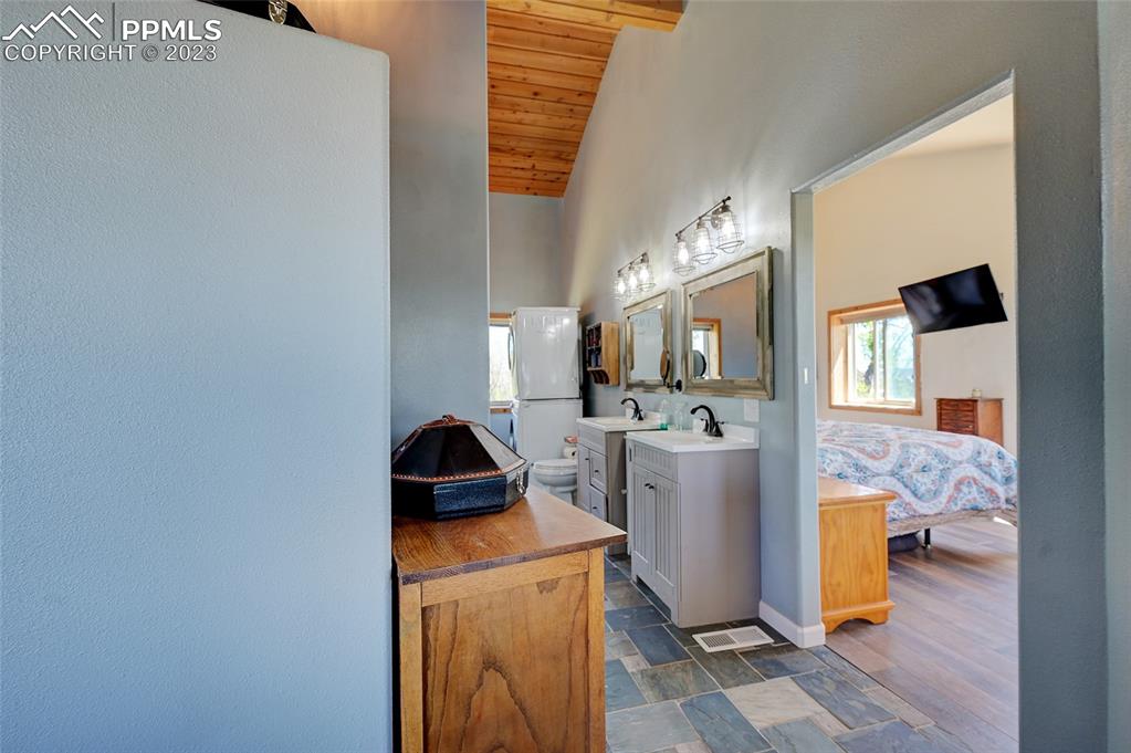 13880 Eastonville Road Elbert, CO 80106 - Photo 16 of 44 a kitchen with a stove and a refrigerator