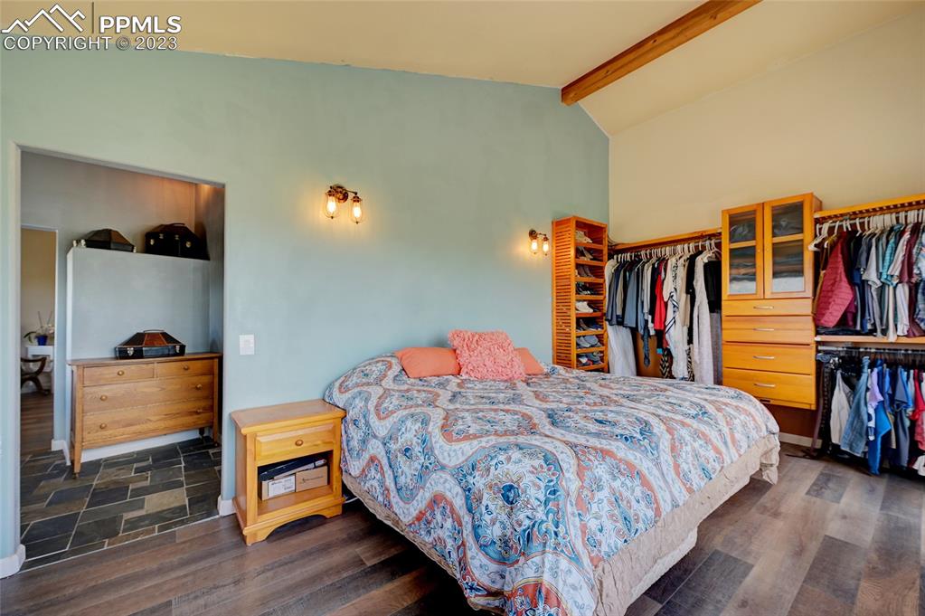 13880 Eastonville Road Elbert, CO 80106 - Photo 20 of 44 a bedroom with a bed and closet