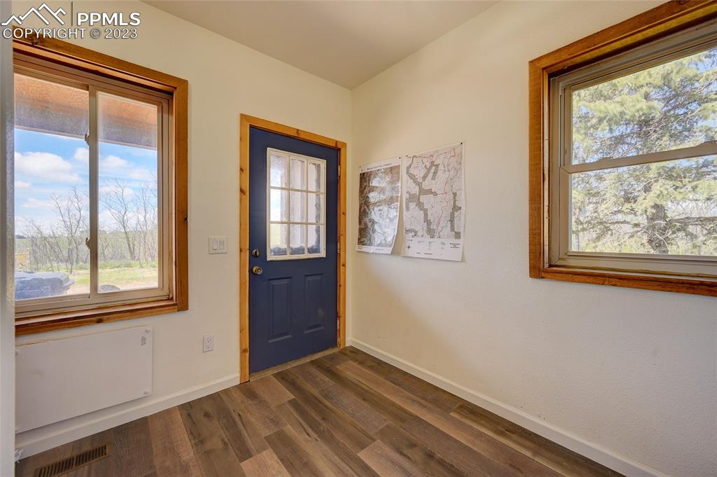 13880 Eastonville Road Elbert, CO 80106 - Photo 29 of 44 an empty room with windows