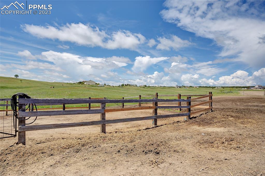 13880 Eastonville Road Elbert, CO 80106 - Photo 44 of 44 a view of a yard with wooden fence