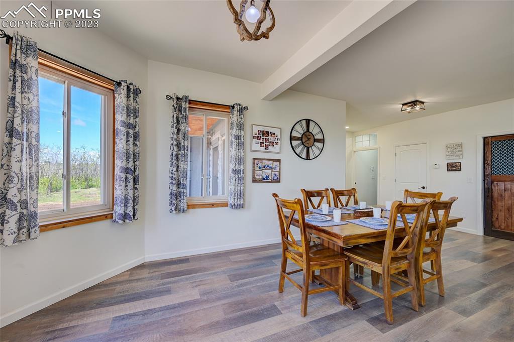 13880 Eastonville Road Elbert, CO 80106 - Photo 6 of 44 a view of a dining room with furniture and window