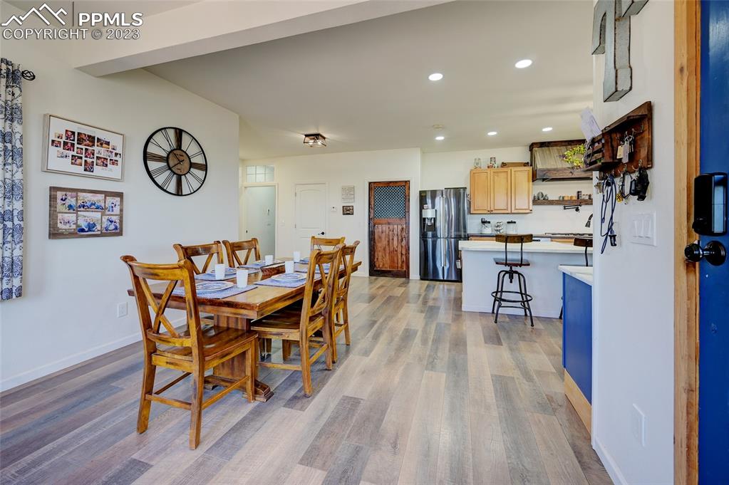 13880 Eastonville Road Elbert, CO 80106 - Photo 7 of 44 a dining room with furniture and wooden floor