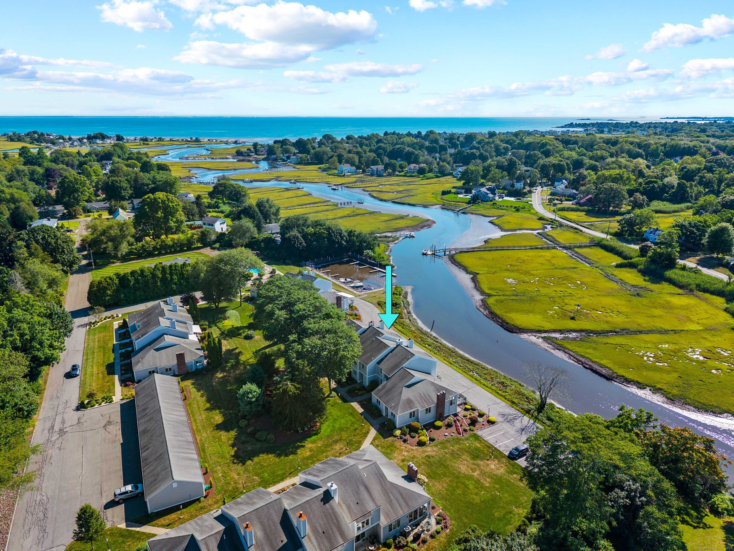 25 Sunset Road, Unit 12 Old Saybrook, CT 06475 - Photo 1 of 1 an aerial view of residential houses with outdoor space
