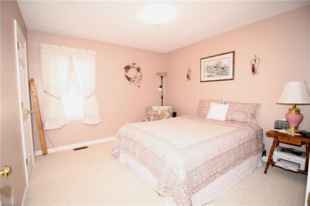 7114 Harper Ridge Court Oak Ridge, NC 27310 - Photo 12 of 28 2nd bedroom.
