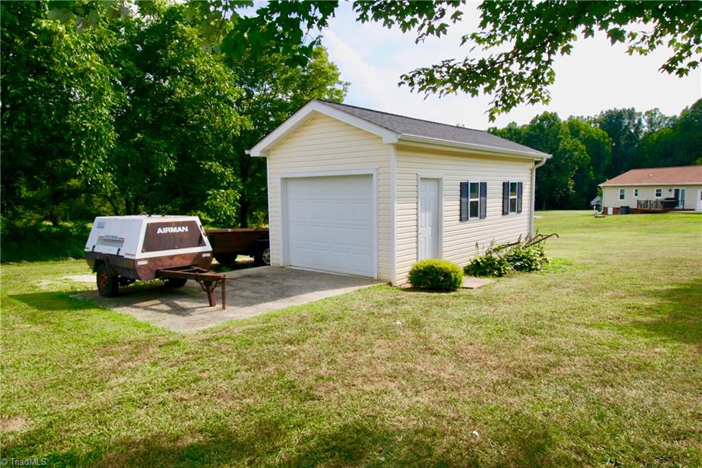 7114 Harper Ridge Court Oak Ridge, NC 27310 - Photo 23 of 28 Extra storage/garage building out back.