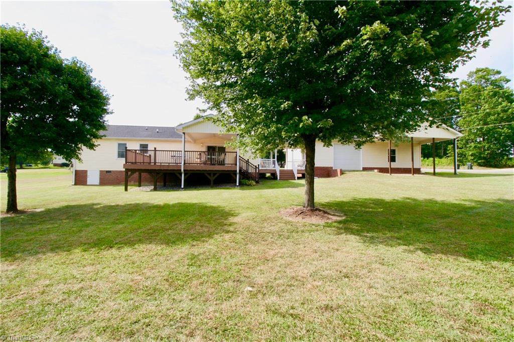 7114 Harper Ridge Court Oak Ridge, NC 27310 - Photo 25 of 28 Back view of property.