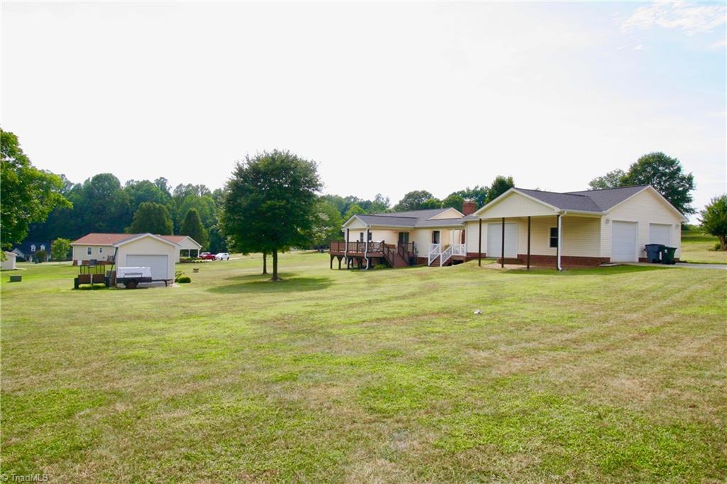 7114 Harper Ridge Court Oak Ridge, NC 27310 - Photo 26 of 28 Left back corner view of property.